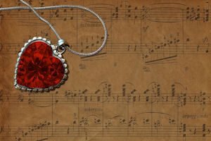 sheet music with a heart necklace