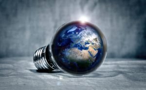 soul story: a lightbulb with the planet earth inside