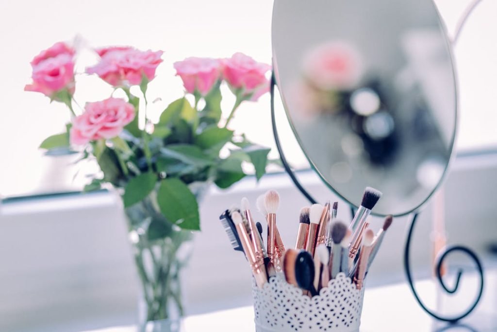 makeup, a mirror, and flowers...
