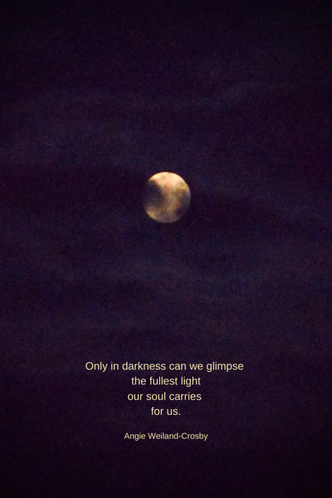 a full moon with dark clouds..."Only in darkness can we glimpse the fullest light our soul carries for us."