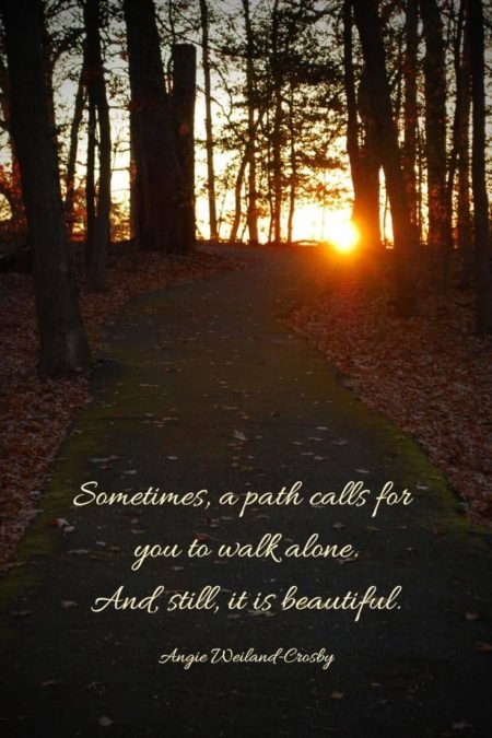 inspirational growth quote with a path at sunset...