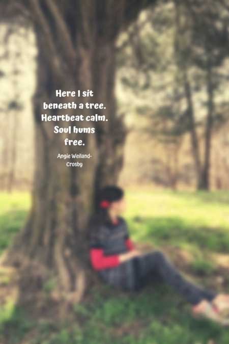 soulful nature quote with a girl under a tree...